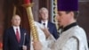 Владимир Путин и Сергей Собянин на службе в православном храме